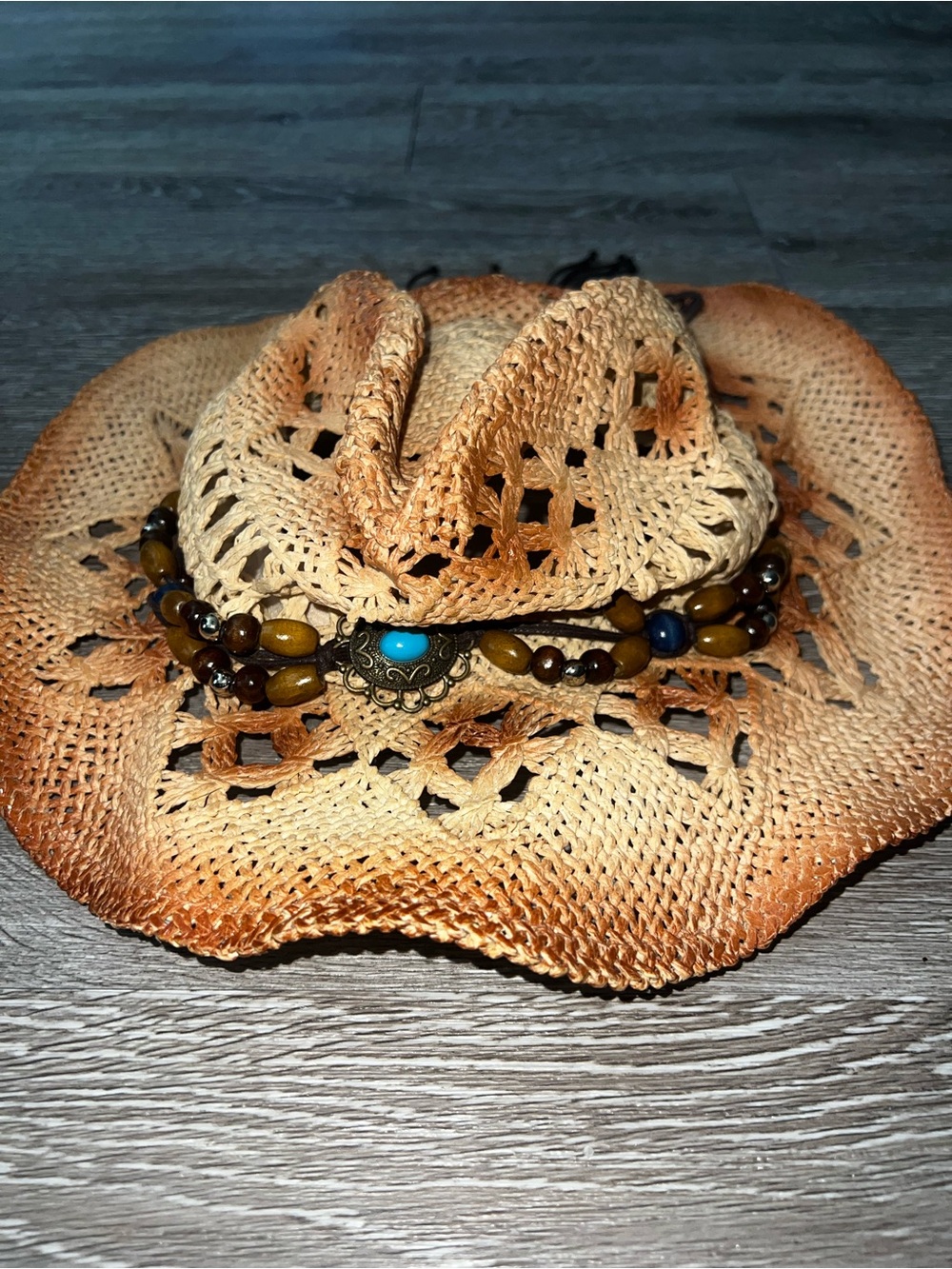 boho-style open-weave crochet straw cowboy hat